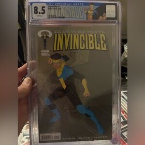 Invincible Comic Book with Blue and Yellow Cover